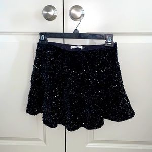 Black, sequin mini skort. New without tags (never worn)